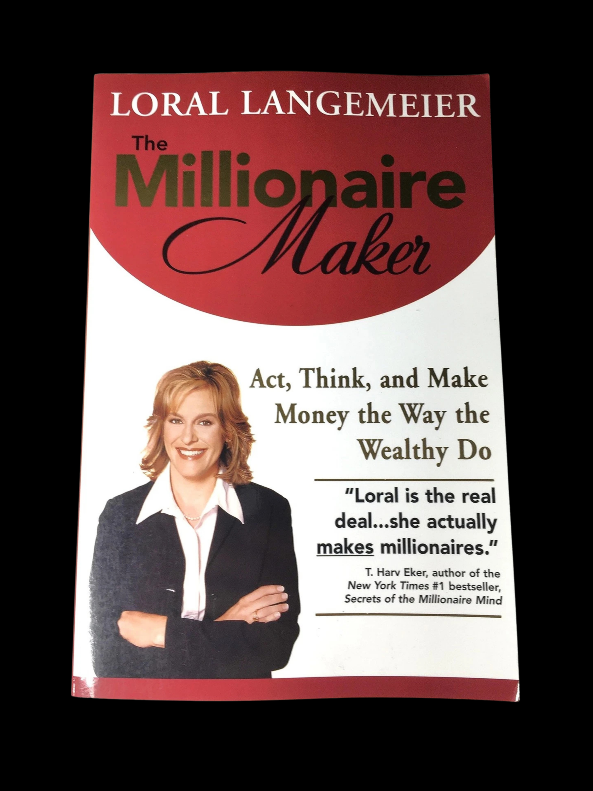The Millionaire Maker book cover by Loral Langemeier wealth building and financial intelligence guide
